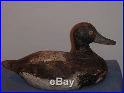 Bluebill Drake wooden duck decoy made by Gus Nilo, circa 1930