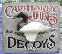 Chesapeake Bay Decoys sign. Wooden original hand painted carved canvasback head