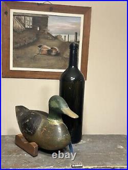 Early 20th Century Louisiana Mallard Duck Decoy with Lead Weight. Unknown Carver