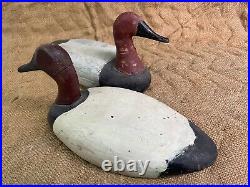 Pair of Vintage Canvasback Wooden Duck Decoys with Weights