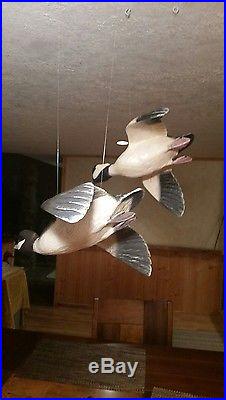 Pair of flying buffleheads, handcarved duck decoy, Casey Edwards