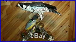 Peregrine falcon and green-winged teal woodcarving, duck decoy, Casey Edwards