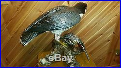 Peregrine falcon and green-winged teal woodcarving, duck decoy, Casey Edwards
