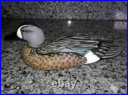 The Canadian Carver Pair of Blue Winged Teal Decoys By L. Fell