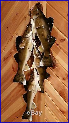 Trophy walleye stringer, duck decoy, carved fish by Casey Edwards